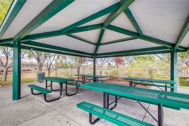 View of property's community featuring a gazebo, a patio, and outdoor dining space | Image 54