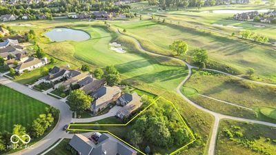 Spacious .45 acre lot overlooking #8 green and #9 tee box with convenient access to the practice areas. | Image 2