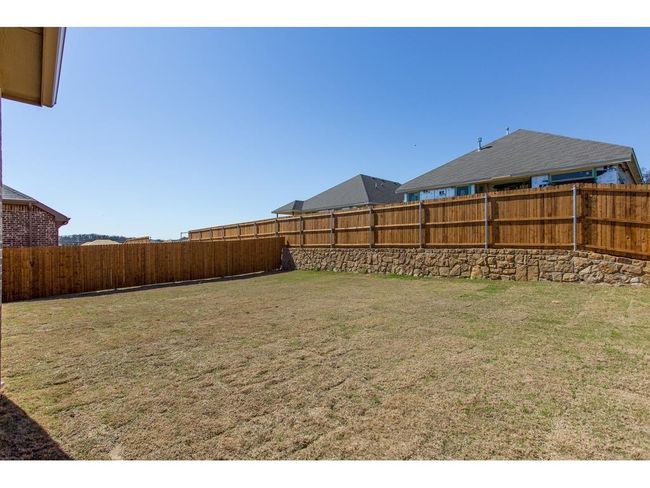Fenced back yard | Image 32