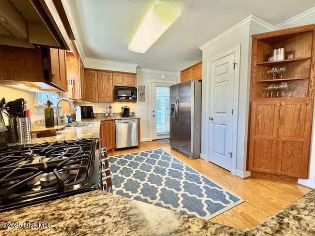 111 Ne 39 Th St, House other with 3 bedrooms, 2 bathrooms and 2 parking in Oak Island NC | Image 11