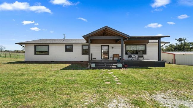 Back of property with a yard and crawl space | Image 4