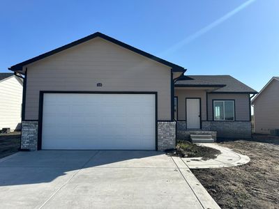 View of front of house with a garage | Image 1