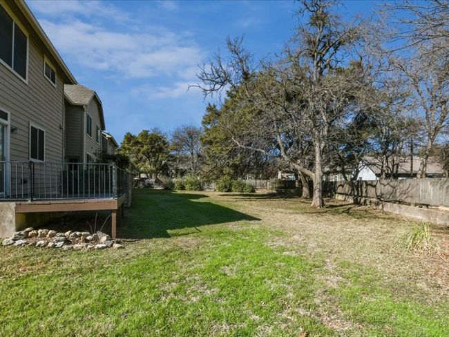 View of yard with fence | Image 27