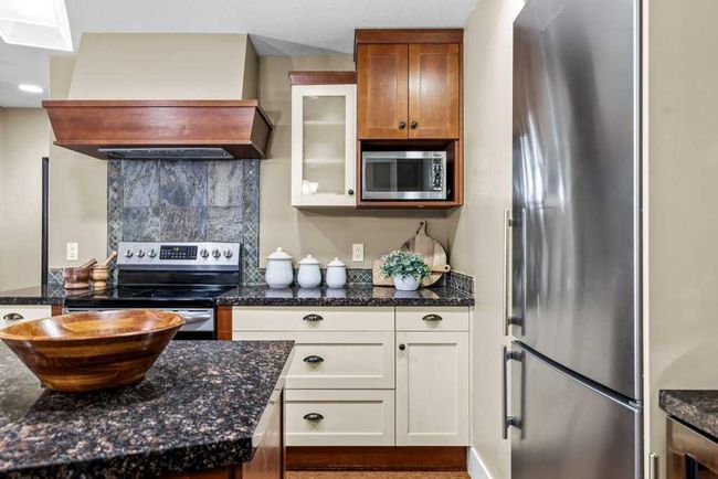 121 - 187 Kananaskis Way, Condo with 2 bedrooms, 2 bathrooms and 1 parking in Canmore AB | Image 10