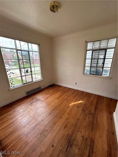 Empty room featuring hardwood / wood-style flooring | Image 3