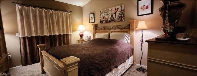 Carpeted bedroom featuring baseboards | Image 12