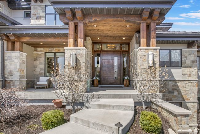 Property entrance with stone siding | Image 6