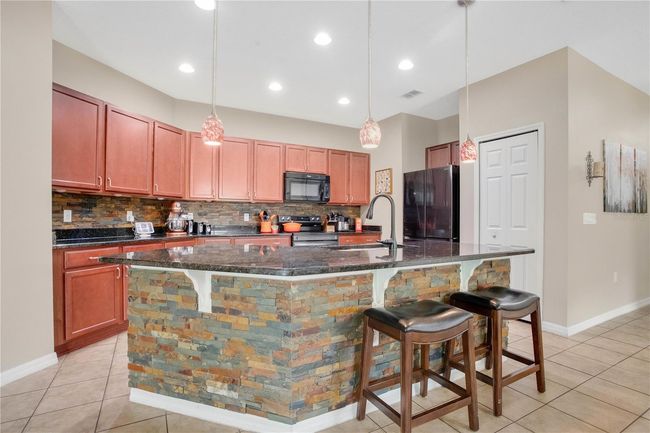 7518 Tangle Brook Blvd, House other with 4 bedrooms, 2 bathrooms and null parking in GIBSONTON FL | Image 7