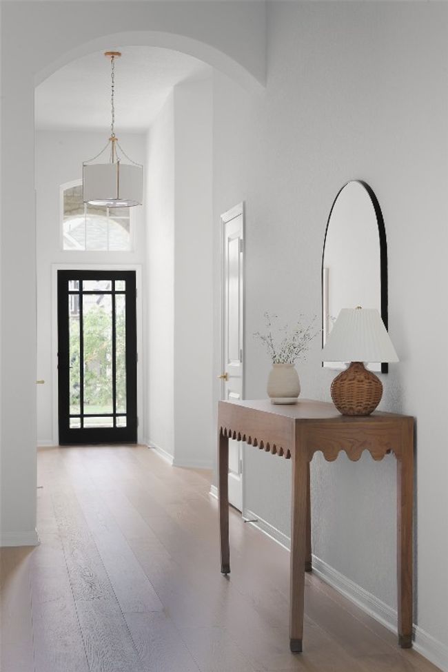 Sunlit entryway creates a warm, welcoming first impression. | Image 5