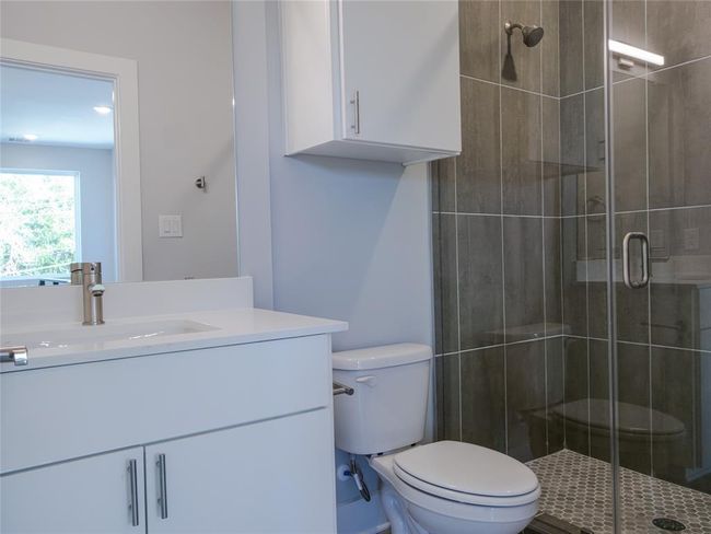 Full bath with vanity and a shower stall | Image 20