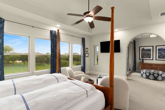 Primary Bedroom with a fantastic view and extra flex space in front of balcony patio. | Image 17