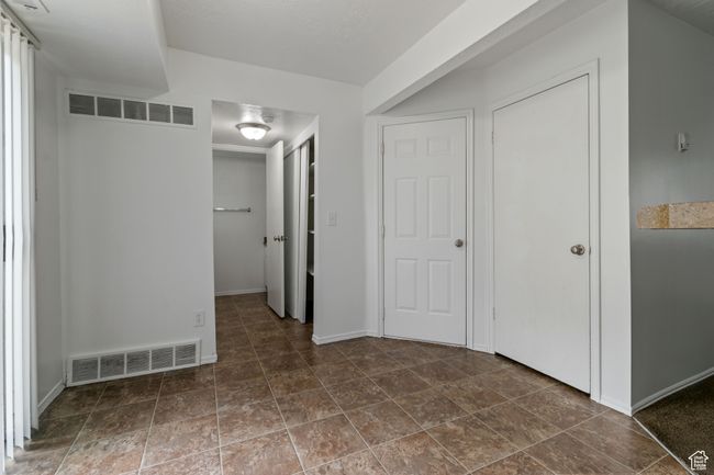 Unfurnished bedroom featuring baseboards | Image 11