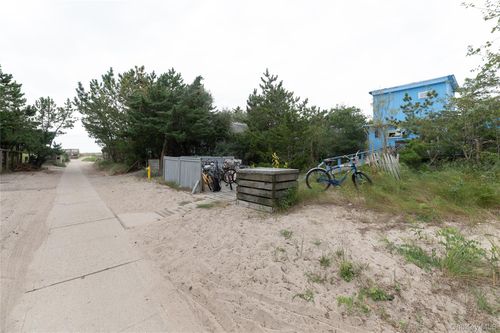 27 Champlain St, Ocean Beach, NY, 11770-2056 | Card Image
