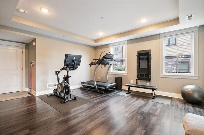 Plenty of room for a home gym in the finished walkout basement! | Image 39