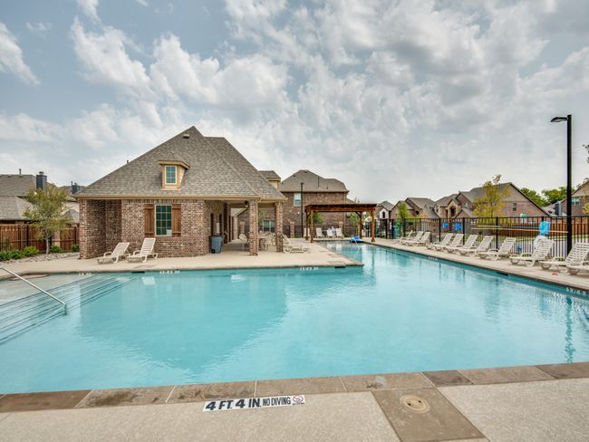 Pool featuring a pergola, fence, and a patio just around the corner | Image 13