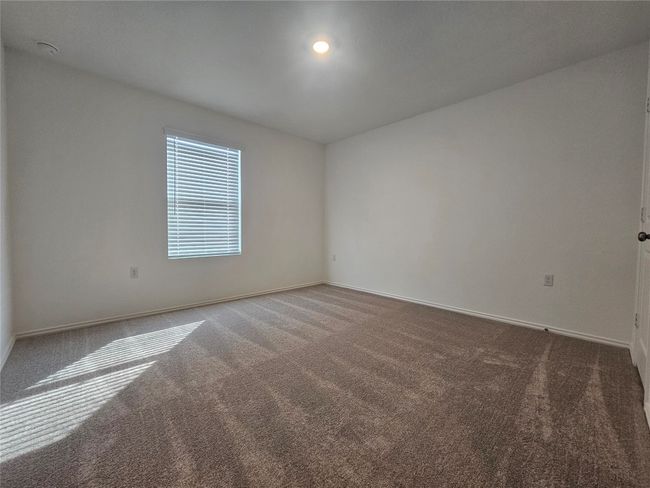 Unfurnished room with carpet and baseboards | Image 23