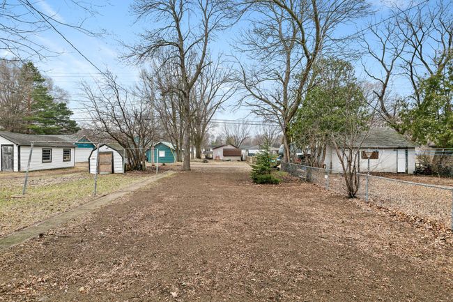 Another view of the large backyard. Plenty of space for outdoor activities. | Image 25