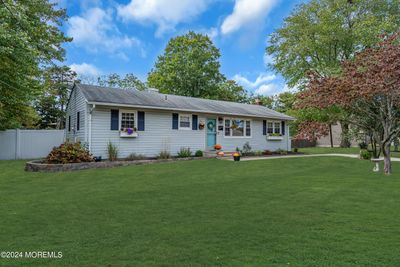 Meticulously maintained ranch in desirable Birchwood Park with beautiful grounds and a pool. | Image 3