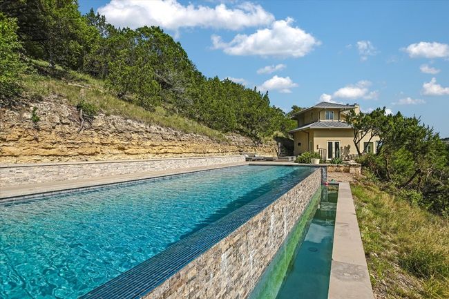 View of pool with an infinity pool | Image 34