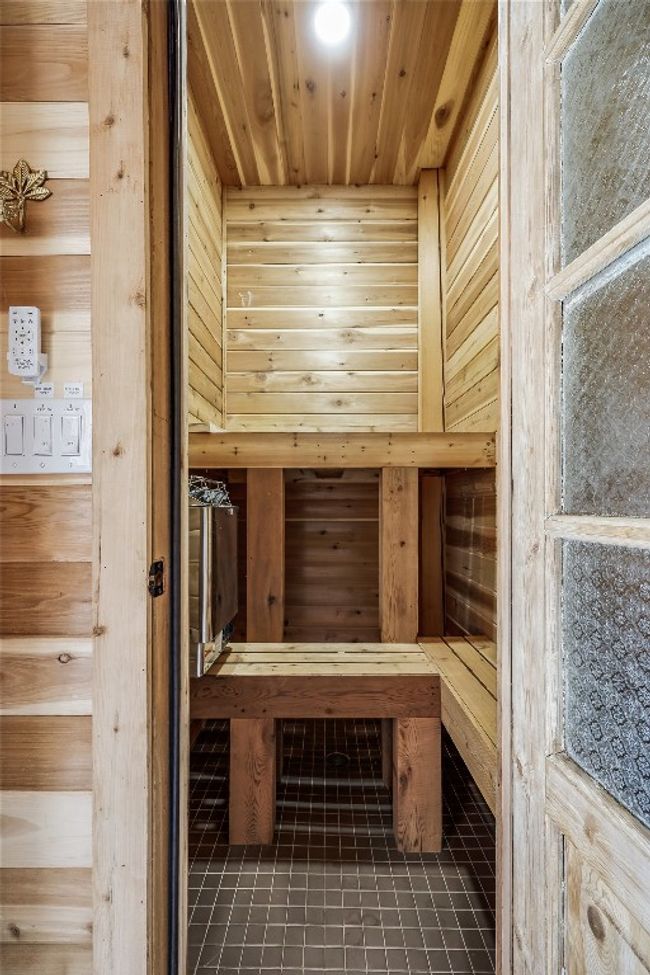 View of sauna featuring tile patterned floors | Image 28
