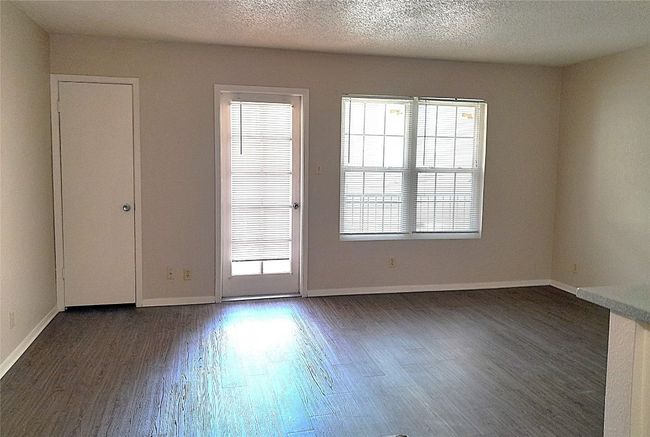 View of living from entry | Image 4