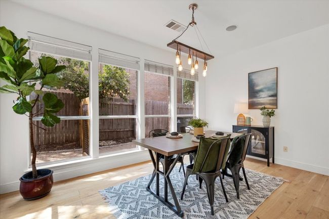 Dining area open to kitchen and living space. Great for entertaining. | Image 12
