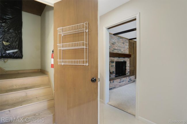 Extra storage & easy attic access | Image 12