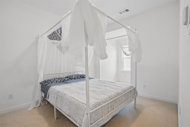 3rd bedroom is located upstairs | Image 22