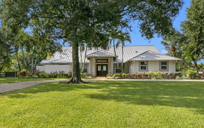 14564 Rolling Rock Place, House other with 5 bedrooms, 3 bathrooms and null parking in Wellington FL | Image 3