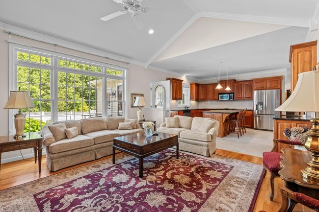 Bright, open living space just off a spacious kitchen. | Image 4