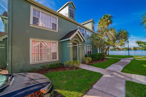 9028 Lake Chase Island Way, TAMPA, FL, 33626-1942 | Card Image