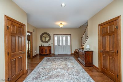 Foyer entrance featuring dark hardwood / wood-style flooring | Image 2