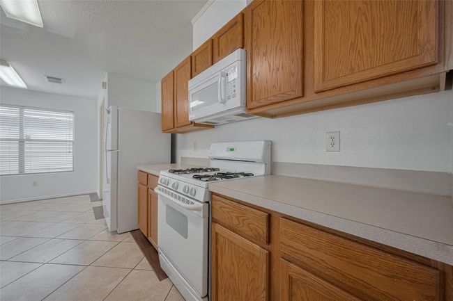 6814 Shallow River Ct, House other with 4 bedrooms, 3 bathrooms and 2 parking in Spring TX | Image 6