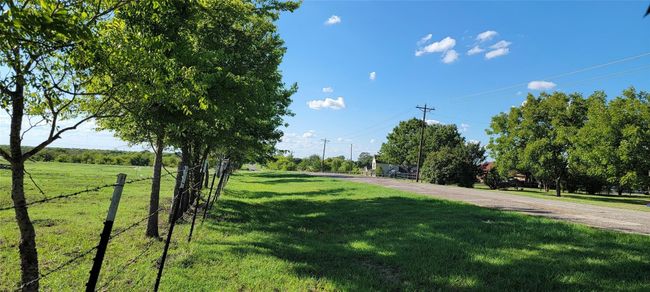 View of the road going towards million-dollar homesites in various development. | Image 17