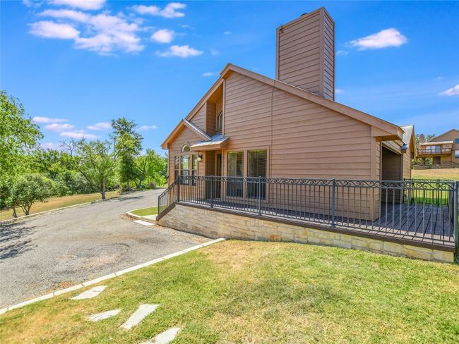 Deck in back wraps around to the side/front entry. | Image 23