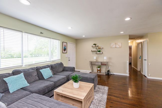 living room with recessed lighting and wood finished floors | Image 4
