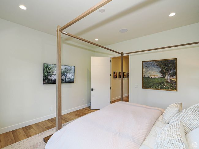 Bedroom featuring light wood-type flooring and recessed lighting | Image 46