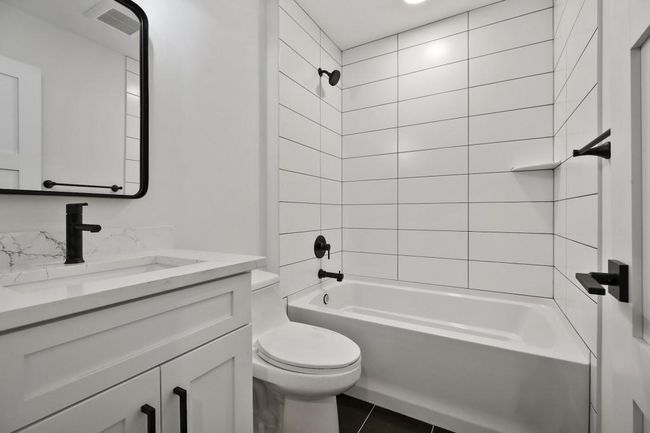 Lower level full bathroom. Pictures of previously built house. | Image 26