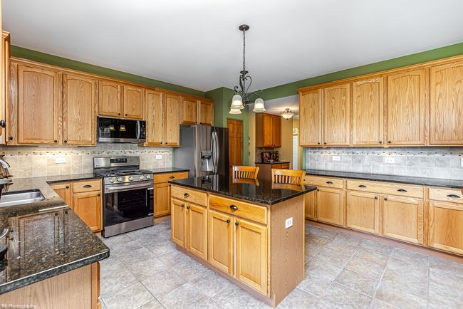 12941 Grande Poplar Cir, House other with 4 bedrooms, 3 bathrooms and 6 parking in Plainfield IL | Image 12