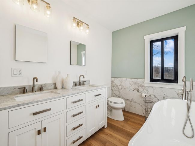 Ensuite bathroom with radiant heat flooring, soaking tub and steam shower | Image 14