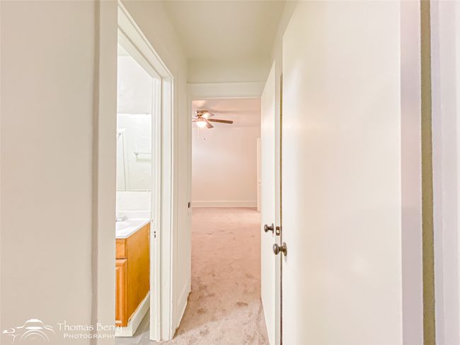 Hall featuring light carpet | Image 21