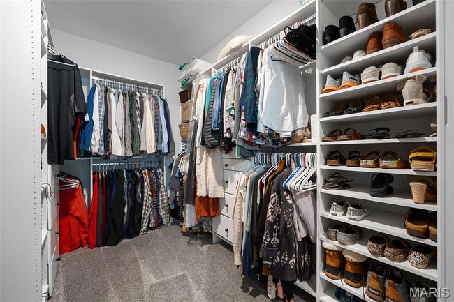 Spacious closet with carpet flooring | Image 18