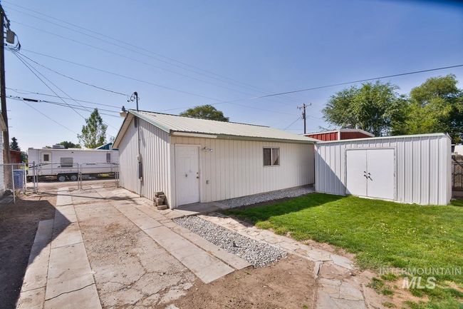 View of shed with a gate | Image 36