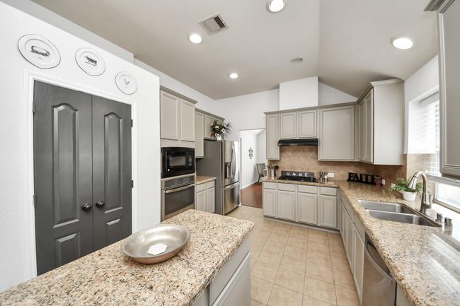15122 Heron Meadow Ln, House other with 3 bedrooms, 2 bathrooms and 2 parking in Cypress TX | Image 18
