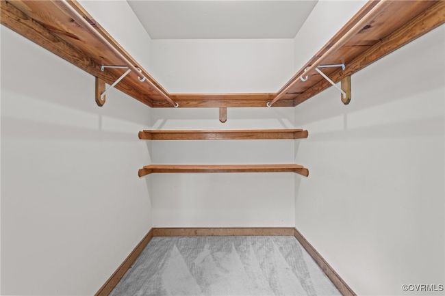 Walk in closet with carpet flooring | Image 29
