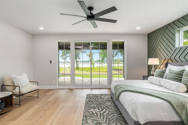 Very spacious with sitting area, lake views & covered patio | Image 15