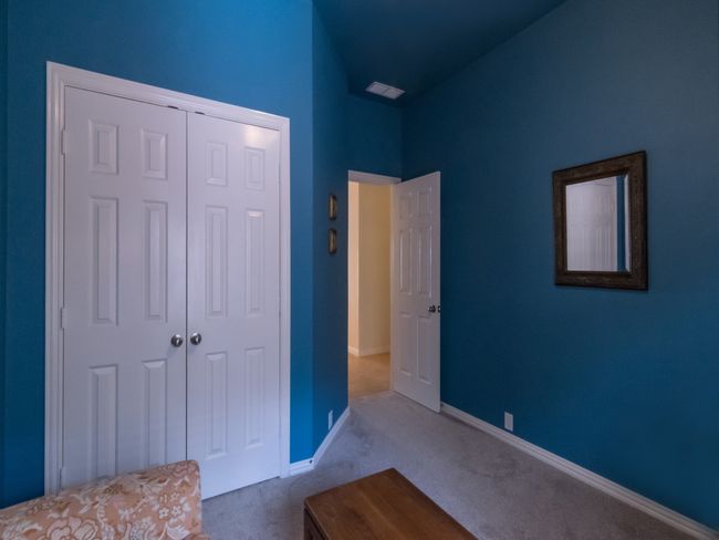 Secondary bedroom with elevated ceiling. | Image 27