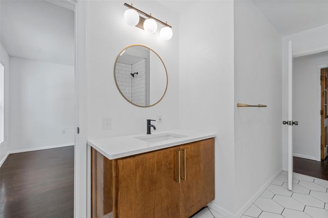 Bathroom with vanity and baseboards | Image 24