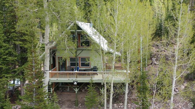 Back of property with a deck | Image 57
