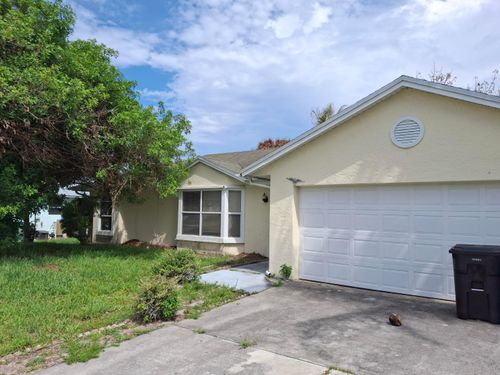 374 Sw De Gouvea Ter, Port St. Lucie, FL, 34984-4357 | Card Image